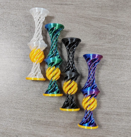3D printed spiral through the toy stereo can be ejected decompression toy