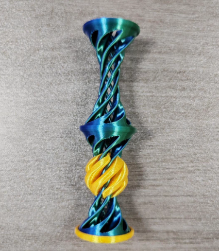 3D printed spiral through the toy stereo can be ejected decompression toy